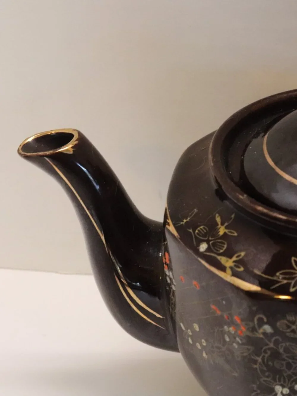 A Porcelain Pitcher made in Japan with Japan Written on Bottom Black